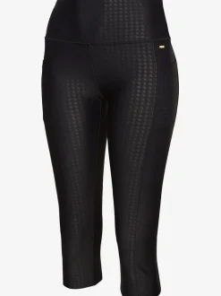 Legging court à large ceinture avec poches et extensible