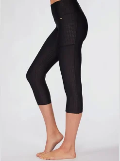 Legging court à large ceinture avec poches et extensible
