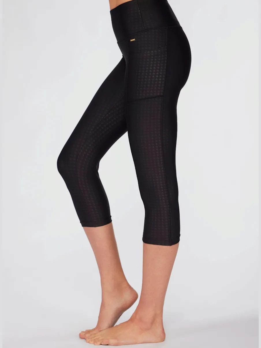 Legging court à large ceinture avec poches et extensible