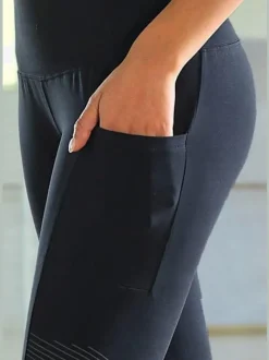 Leggings avec motifs réfléchissants et poche téléphone pratique