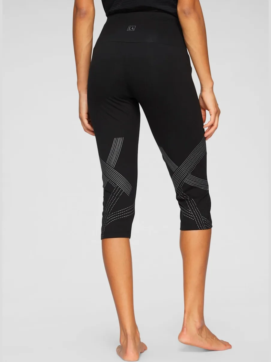 Leggings corsaires avec imprimé réfléchissant et large ceinture
