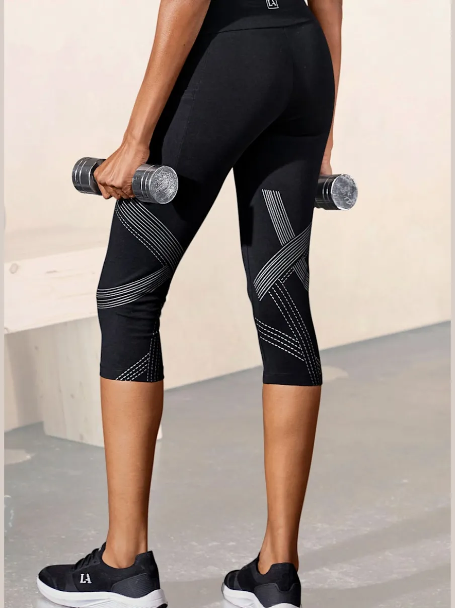 Leggings corsaires avec imprimé réfléchissant et large ceinture