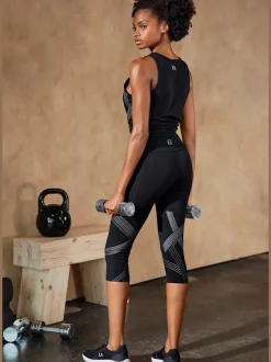 Leggings corsaires avec imprimé réfléchissant et large ceinture