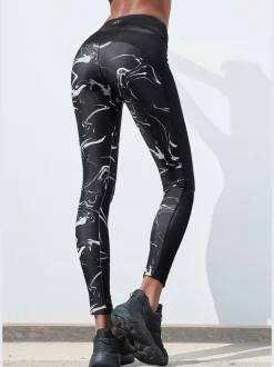 Leggings performance avec empiècements et poche ceinture
