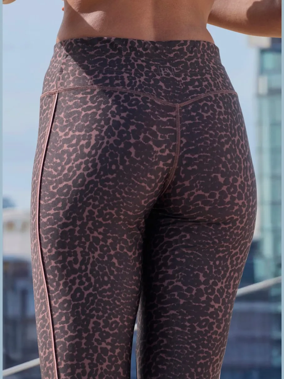 Leggings performance à imprimé animal avec ceinture élastique et passepoils contrastés