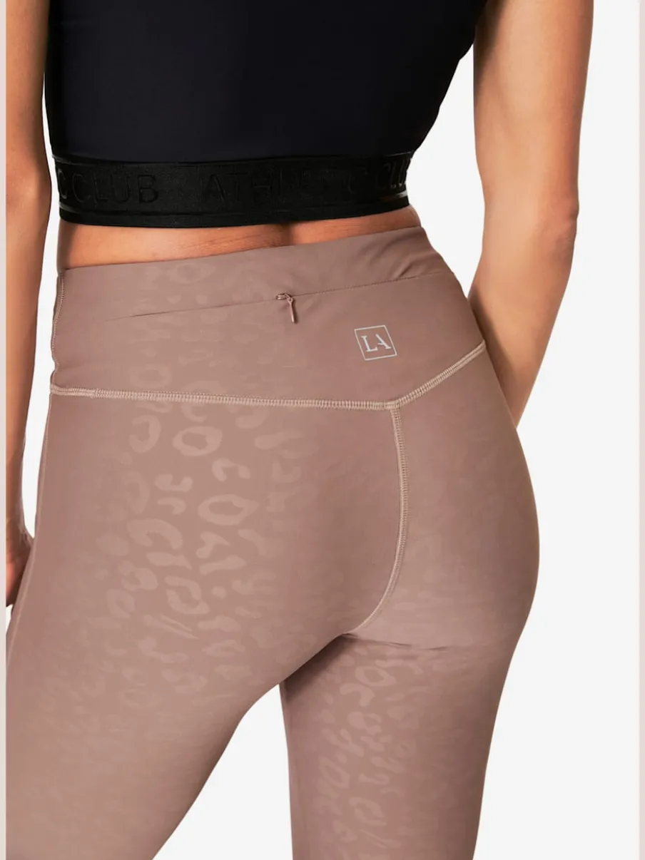 Leggings techniques performance avec empiècements en maille léopard