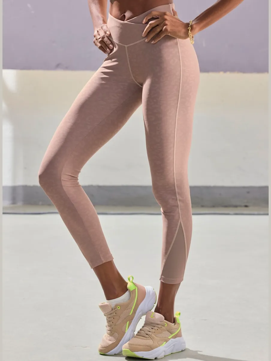 Leggings techniques performance avec empiècements en maille léopard
