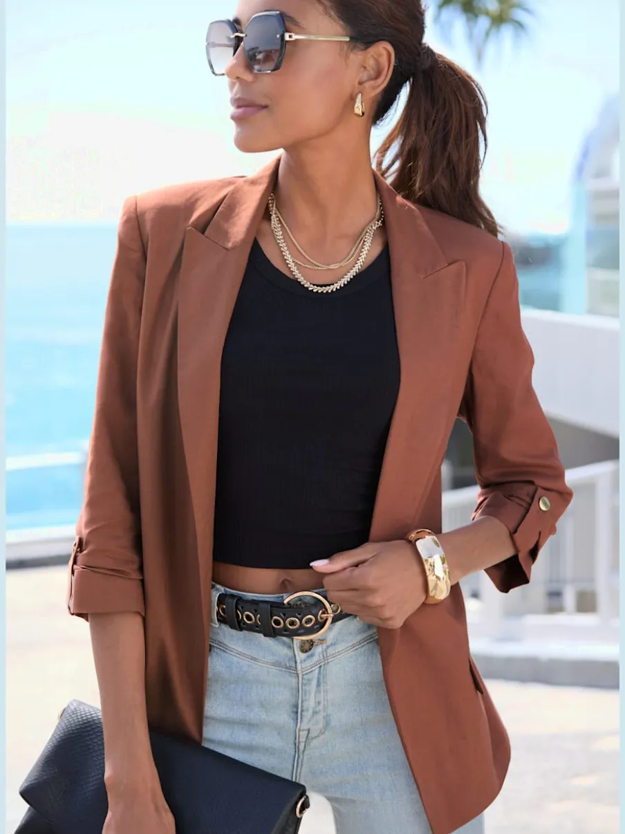 Long blazer à fines épaulettes et manches froncées avec doublure douce