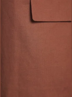 Long blazer à fines épaulettes et manches froncées avec doublure douce