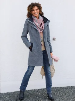 Manteau court avec capuche et poches pratiques