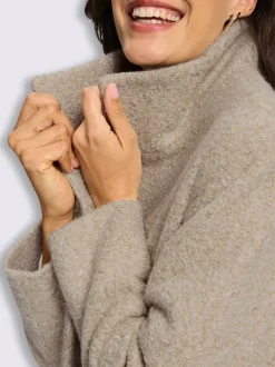 Manteau court qualité bouclée chaude
