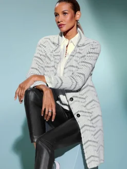 Manteau en tricot doux avec col à revers et poches