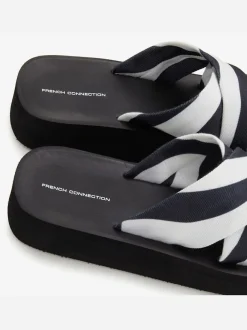 Mules chaussures de bain estivales au look animal tendance avec semelle imperméable et talon légèrement compensé