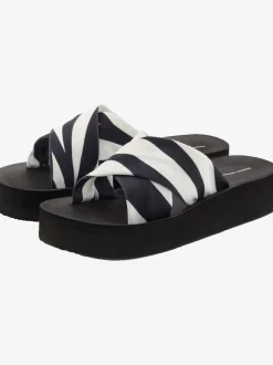 Mules chaussures de bain estivales au look animal tendance avec semelle imperméable et talon légèrement compensé