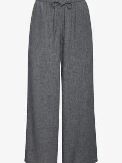 Pantalon ample avec ceinture et manches courtes en matière légère
