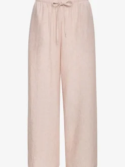 Pantalon ample avec ceinture et manches courtes en matière légère