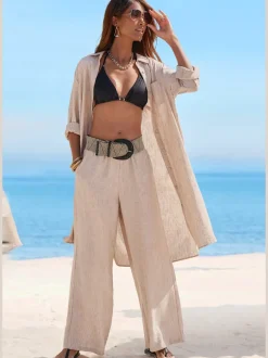 Pantalon ample avec ceinture et manches courtes en matière légère