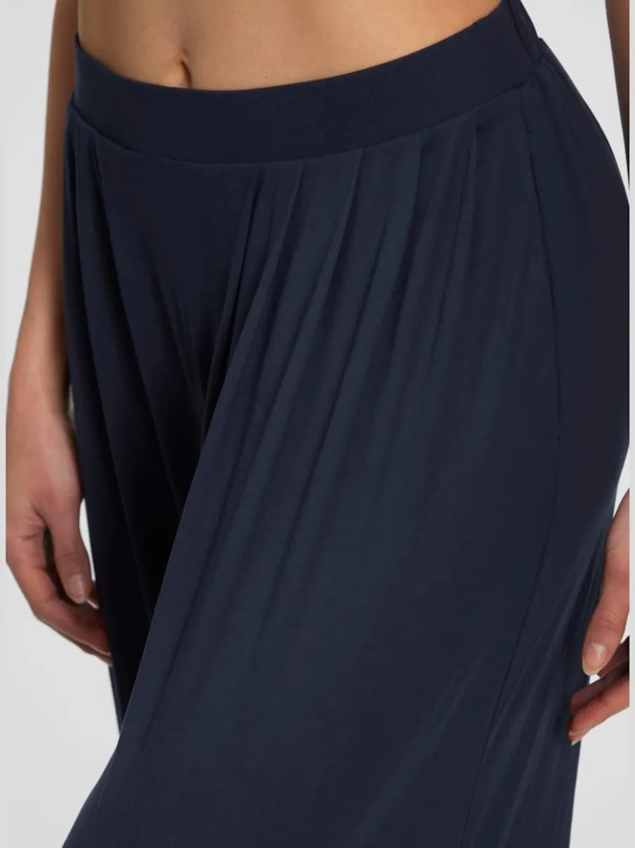 Pantalon ample doux avec pinces et poches latérales