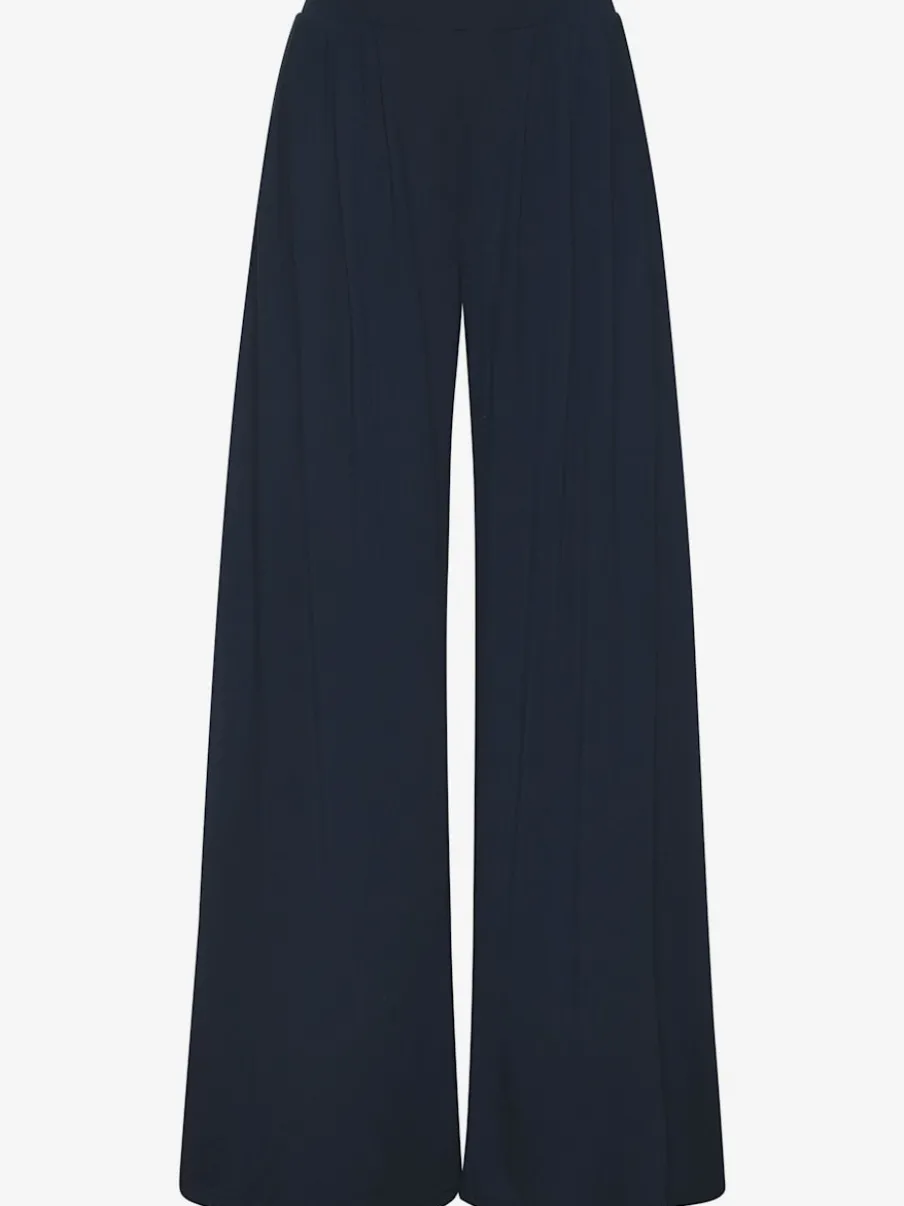 Pantalon ample doux avec pinces et poches latérales