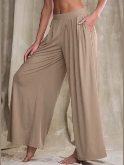 Pantalon ample doux avec pinces et poches latérales