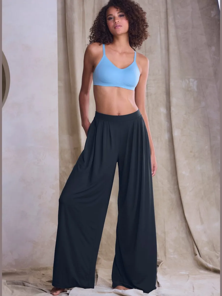 Pantalon ample doux avec pinces et poches latérales