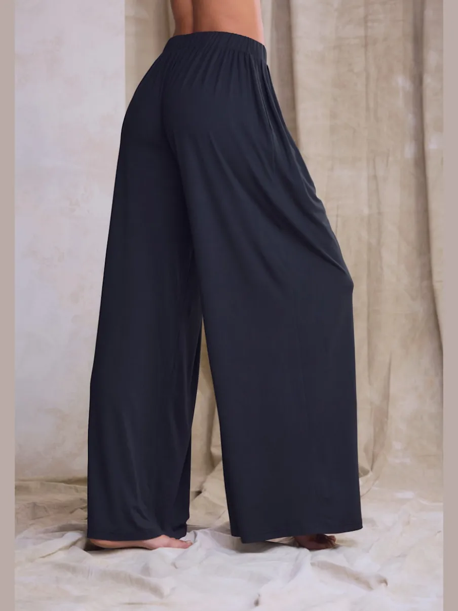 Pantalon ample doux avec pinces et poches latérales