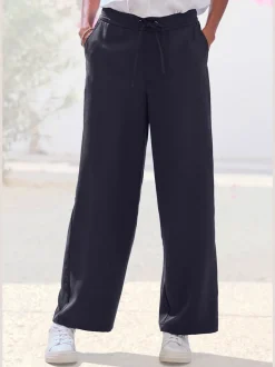 Pantalon ample à poches fendues avec ceinture à cordon