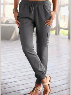 Pantalon avec ceinture smockée et poches cargo latérales