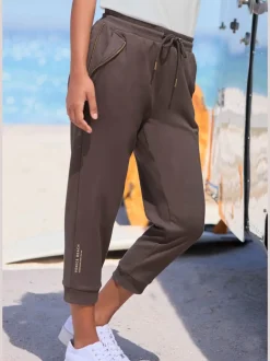 Pantalon 7/8 avec cordon et poches zippées pratiques