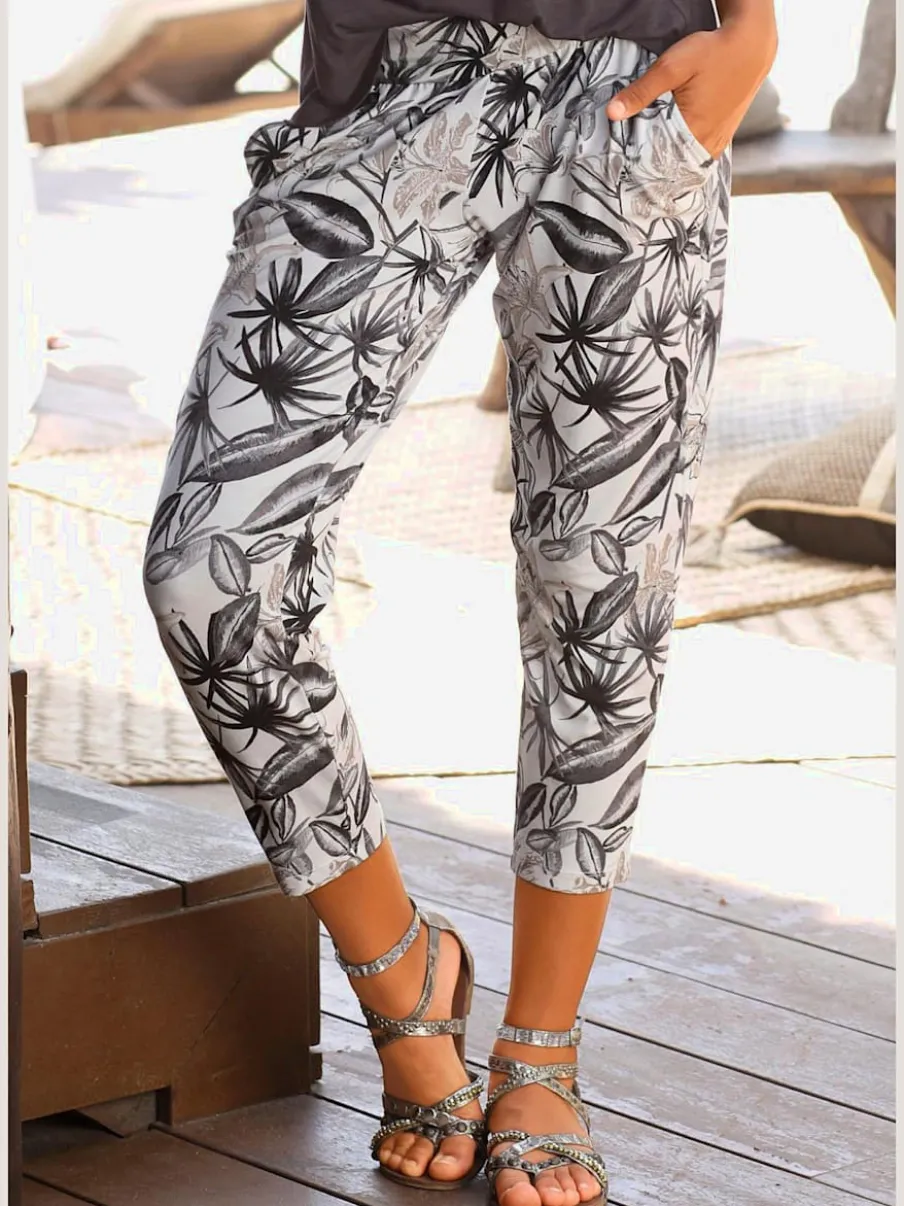 Pantalon 7/8 avec imprimé floral et poches latérales