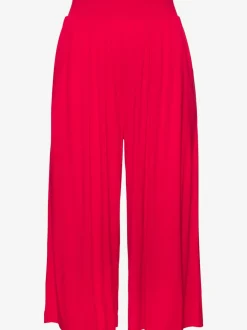 Pantalon avec large ceinture élastique et poches.