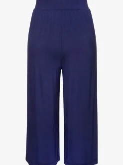 Pantalon avec large ceinture élastique et poches.