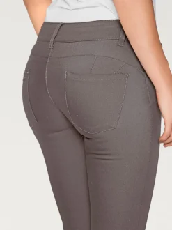 Pantalon bootcut en tissu extensible avec effet ventre plat