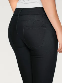Pantalon bootcut en tissu extensible avec effet ventre plat