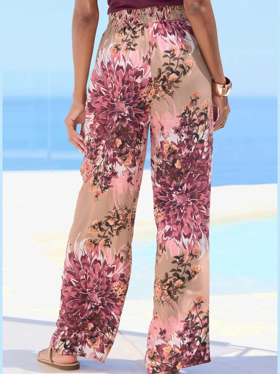 Pantalon à ceinture élastique avec poches latérales imprimé fleuri