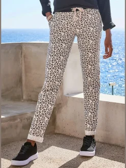 Pantalon confortable avec poches fendues et ourlet à revers