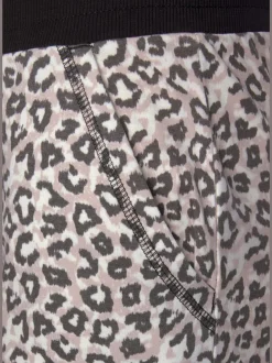Pantalon confortable avec poches fendues et ourlet à revers