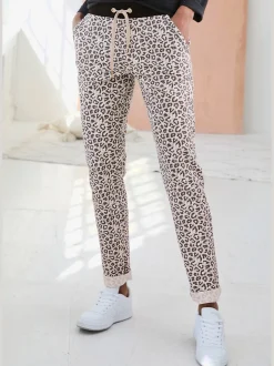 Pantalon confortable avec poches fendues et ourlet à revers