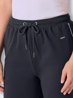Pantalon court en matière sweat avec passepoil double sportif et ceinture élastique