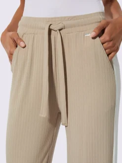Pantalon côtelé confortable avec ceinture élastique et empiècements sportifs