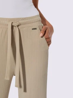 Pantalon côtelé confortable avec ceinture élastique et empiècements sportifs