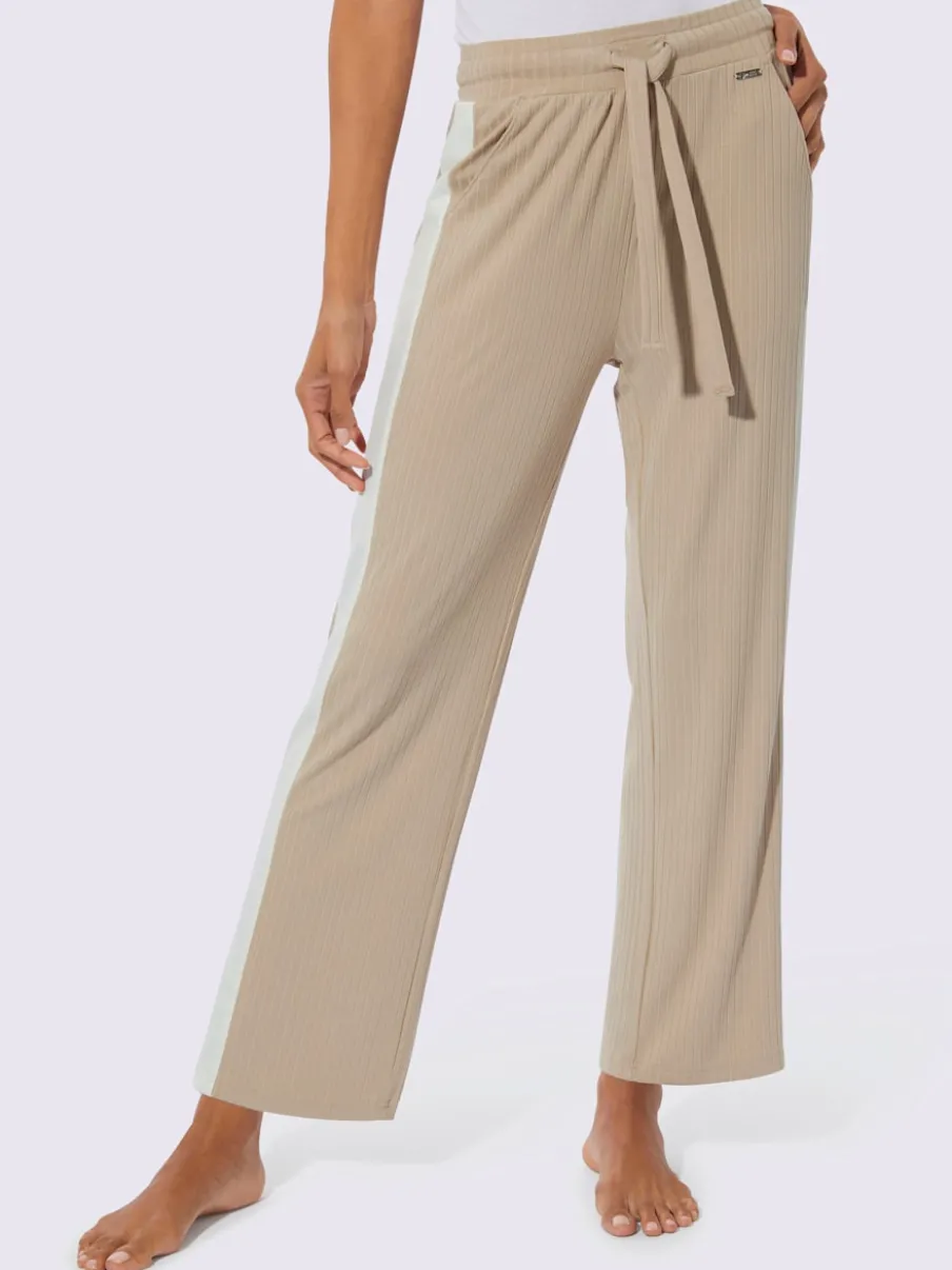 Pantalon côtelé confortable avec ceinture élastique et empiècements sportifs