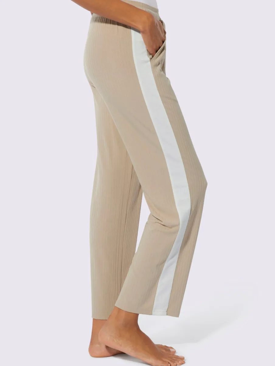Pantalon côtelé confortable avec ceinture élastique et empiècements sportifs