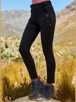 Pantalon de trekking ajusté avec poches zippées pratiques