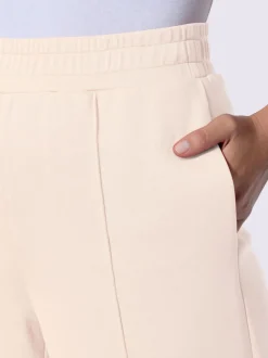 Pantalon droit en sweat avec ceinture élastique et poches