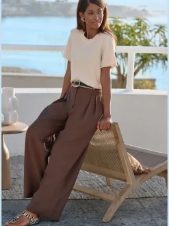 Pantalon d'été chic avec pinces et poches latérales