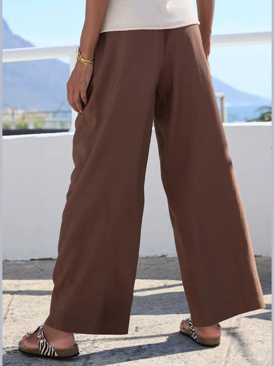 Pantalon d'été chic avec pinces et poches latérales