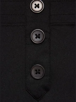 Pantalon détente en matière douce avec jambes droites et patte de boutonnage