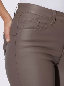 Pantalon effet ventre plat avec coupe skinny et brillance raffinée