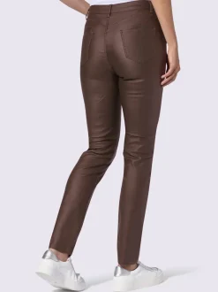 Pantalon effet ventre plat avec coupe skinny et brillance raffinée